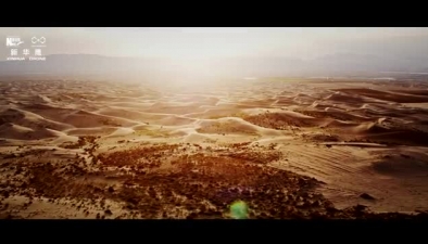 新華網航拍“沙變土”發明 讓沙漠變綠洲